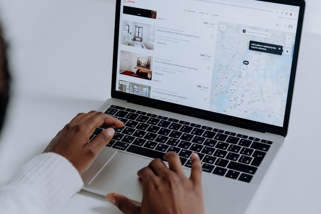 A person searching for hotels online